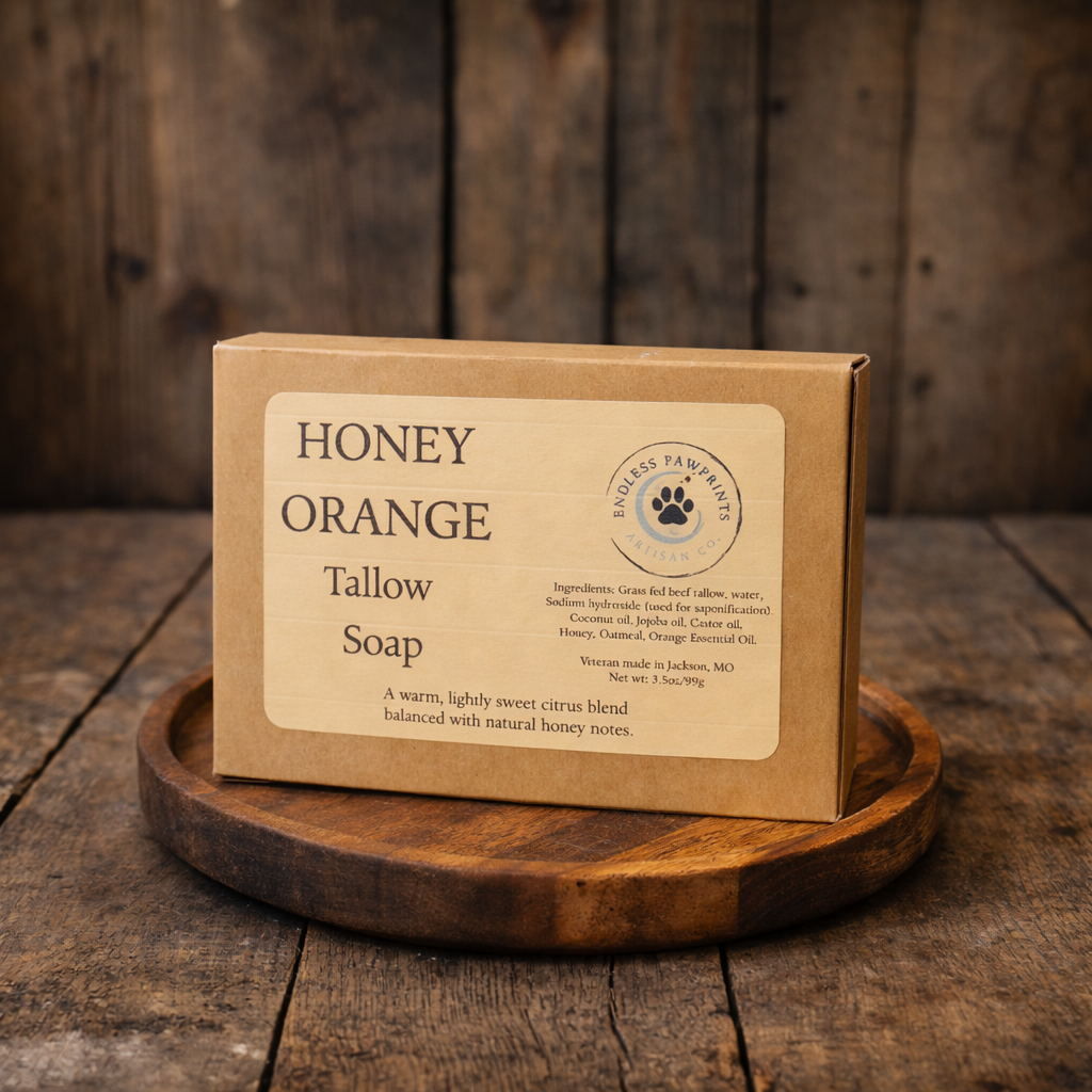 Honey Orange Tallow Soap packaging on a wooden surface with a rustic background