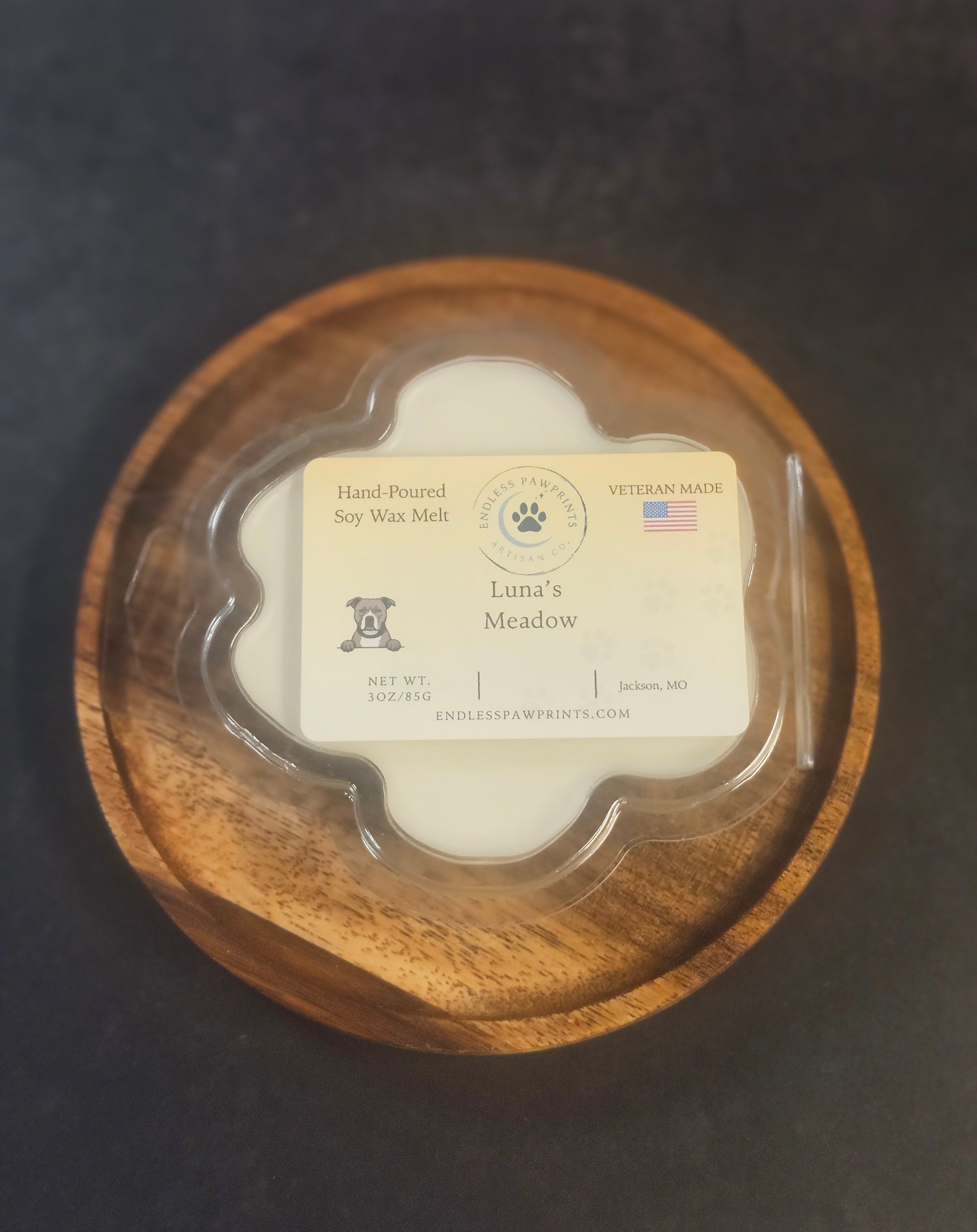 Luna's meadow wax melt in a paw print clam shell