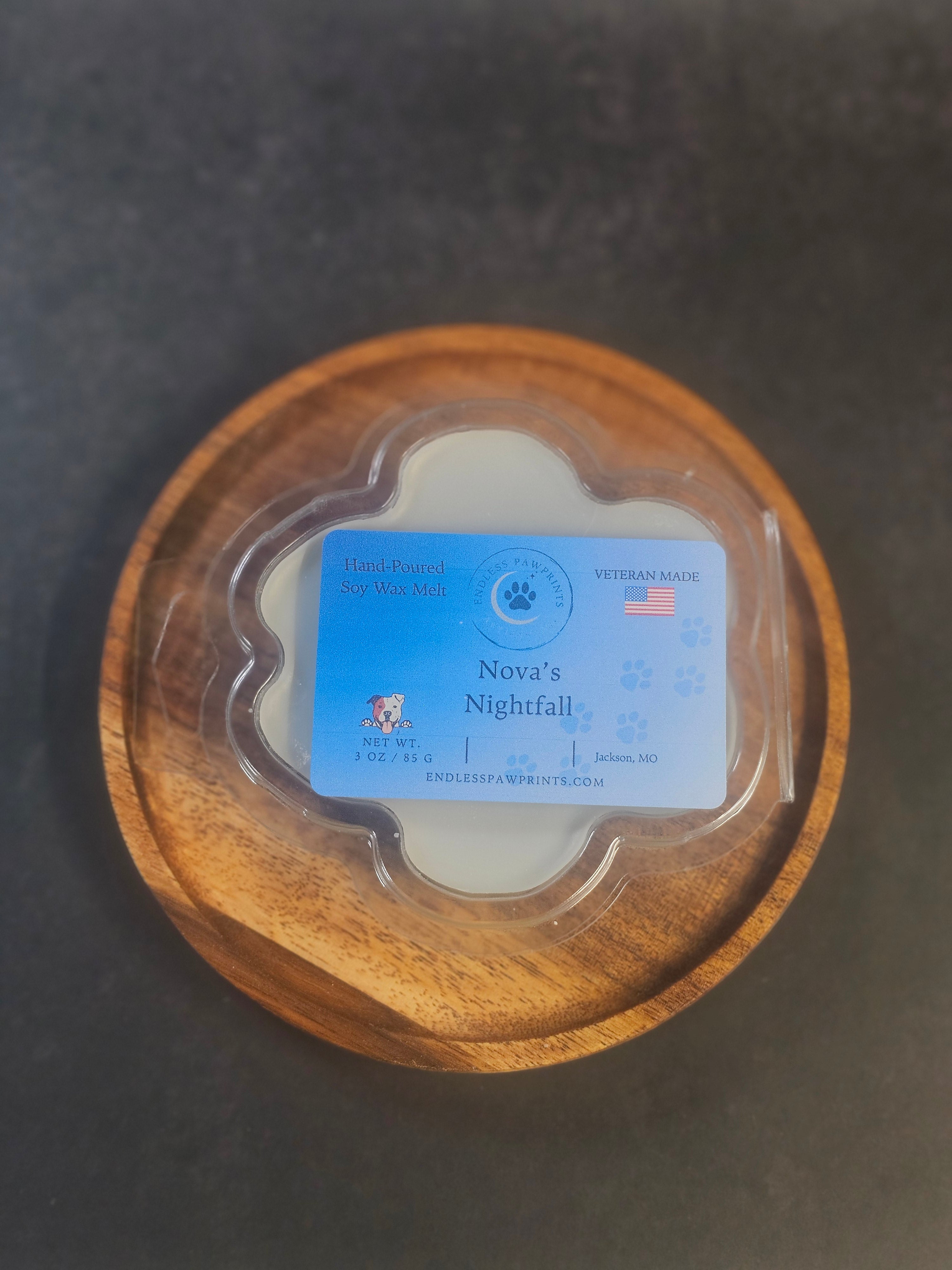 Nova's Nightfall wax melt in a paw print clam shell